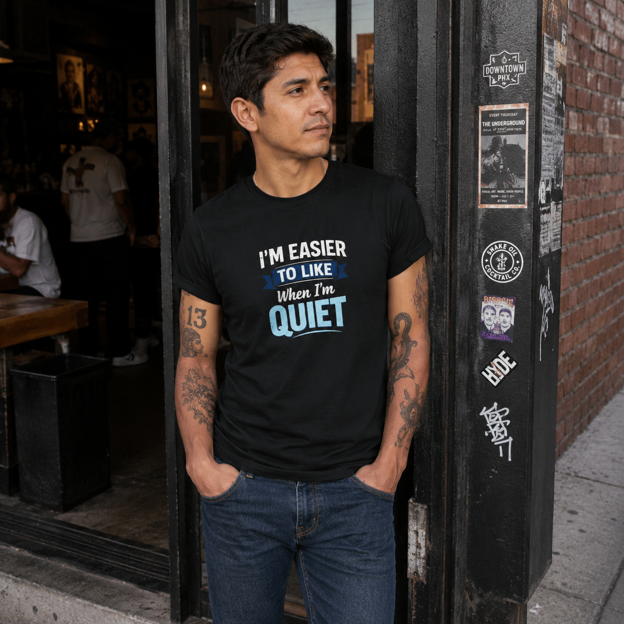 Mayhem Haus I’m Easier to Like When I’m Quiet T-Shirt on a person standing by a brick wall