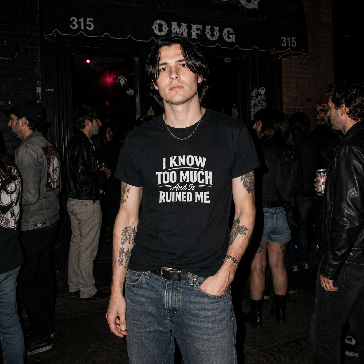 Mayhem Haus I Know Too Much And It Ruined Me T-Shirt on a person with tattoos
