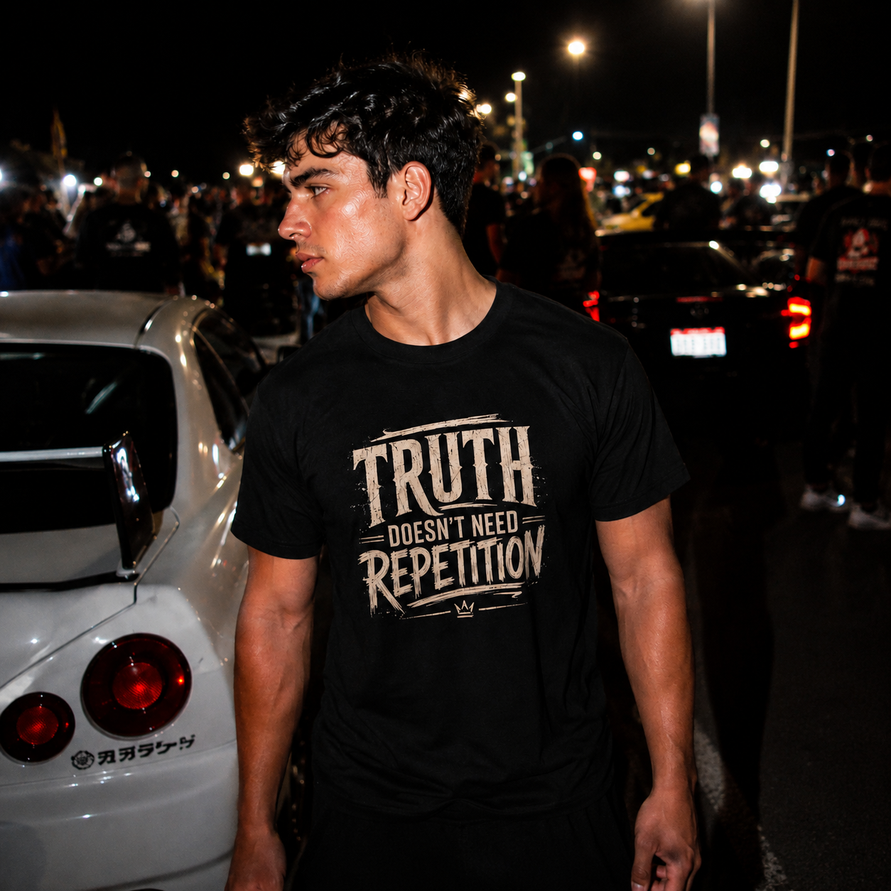 Mayhem Haus Truth Doesn’t Need Repetition T-Shirt on a man at night