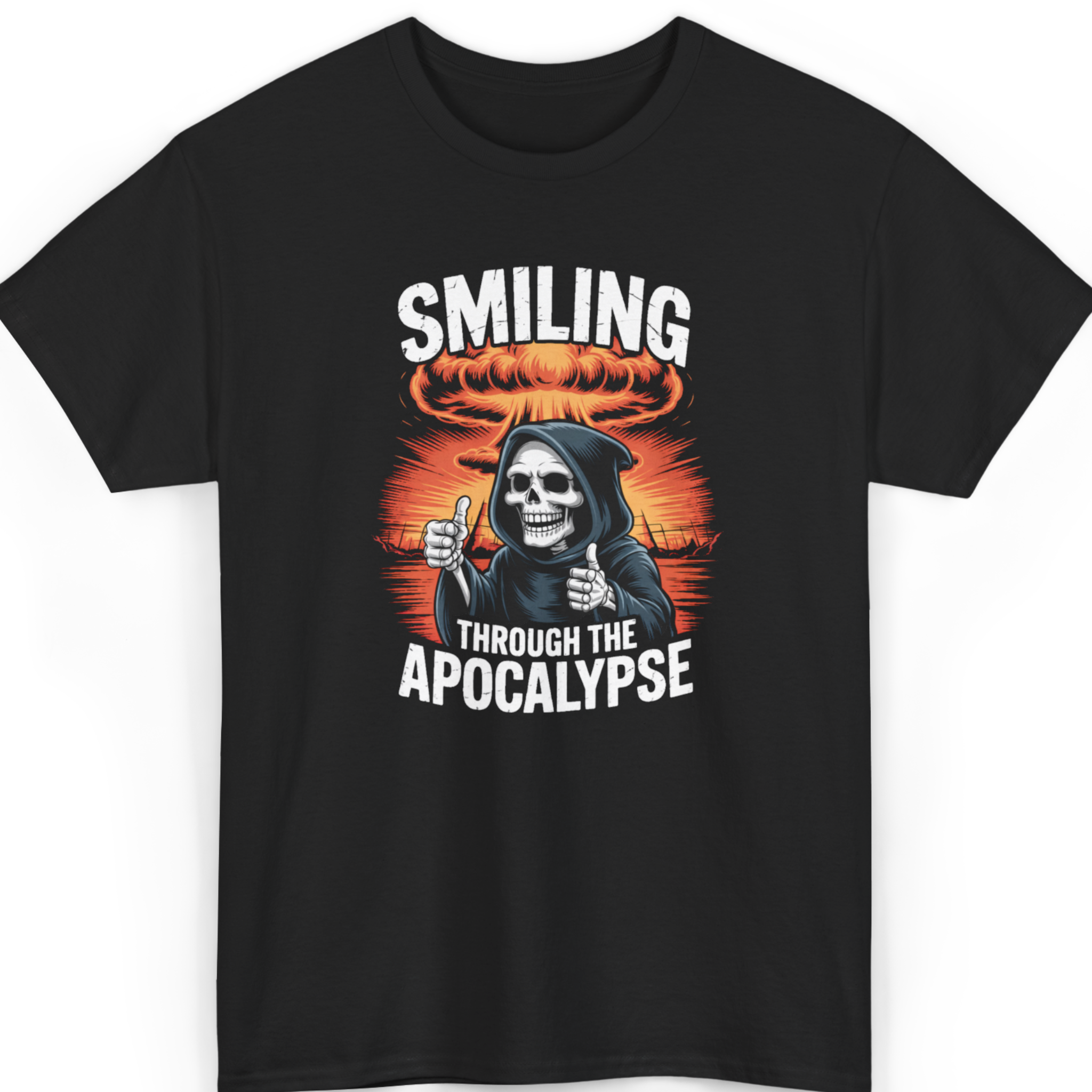 Black t-shirt with a graphic design of a skeleton giving a thumbs up under an atomic bomb cloud, with text 'Smiling through the Apocalypse'.