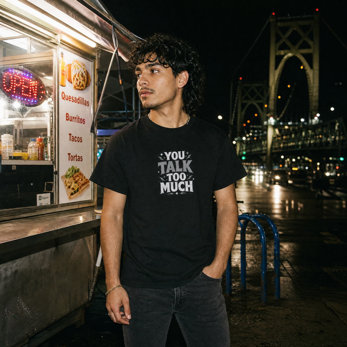 Mayhem Haus You Talk Too Much T-Shirt on a person at night by a food truck