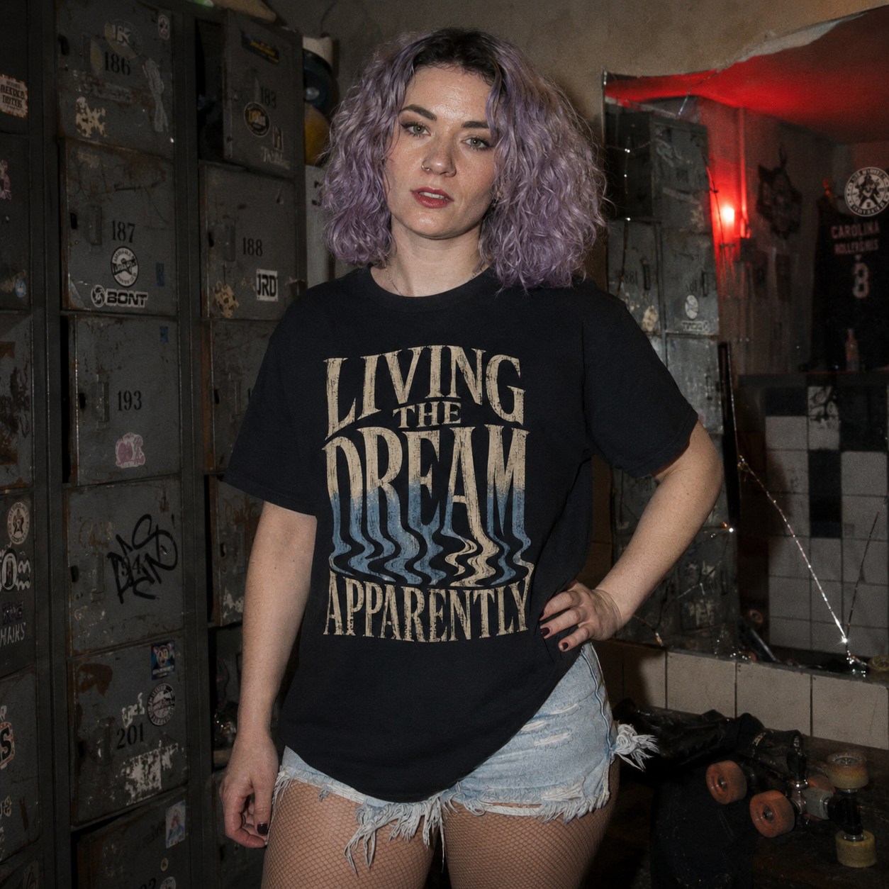 Mayhem Haus Living The Dream Apparently T-Shirt on a person with purple hair and fishnet stockings