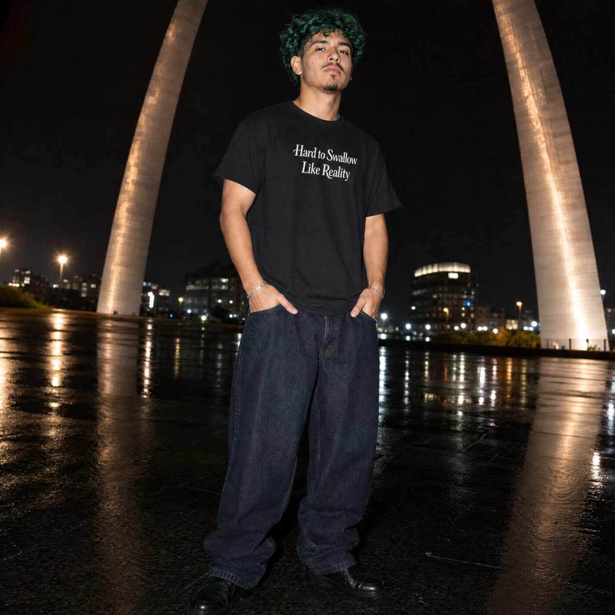 Mayhem Haus Hard to Swallow Like Reality T-Shirt on a person with green hair at night